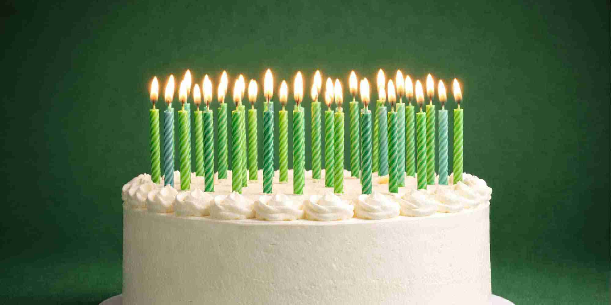 Cake with lit candles celebrating 40 years of weatherization