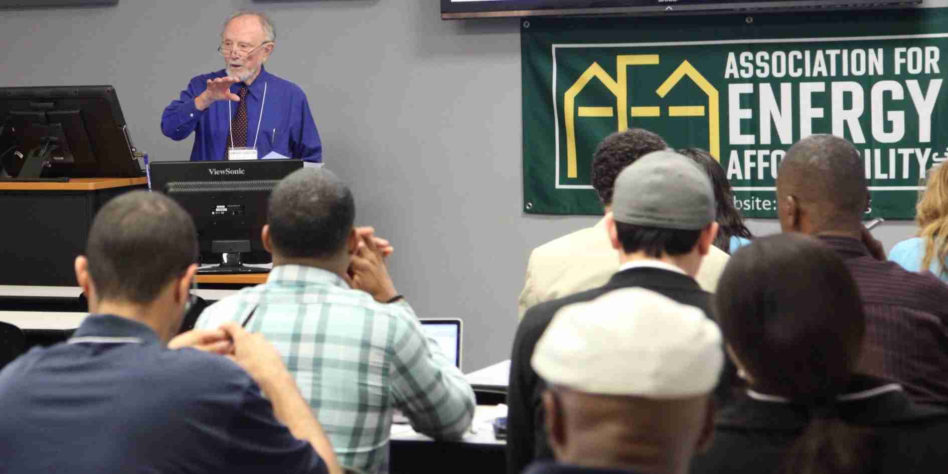 David Hepinstall presenting to an audience at an energy efficiency forum at AEA’s facility