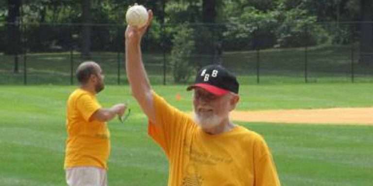 David Hepinstall pitching during AEA’s Summer Games softball game in Central Park